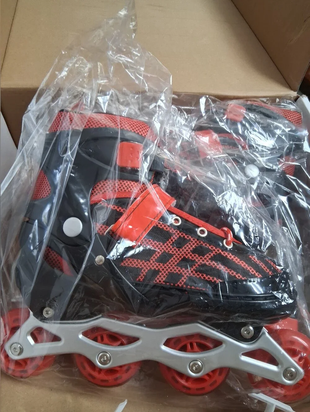NIB-Youth Red and Black Adjustable Inline Roller Skates